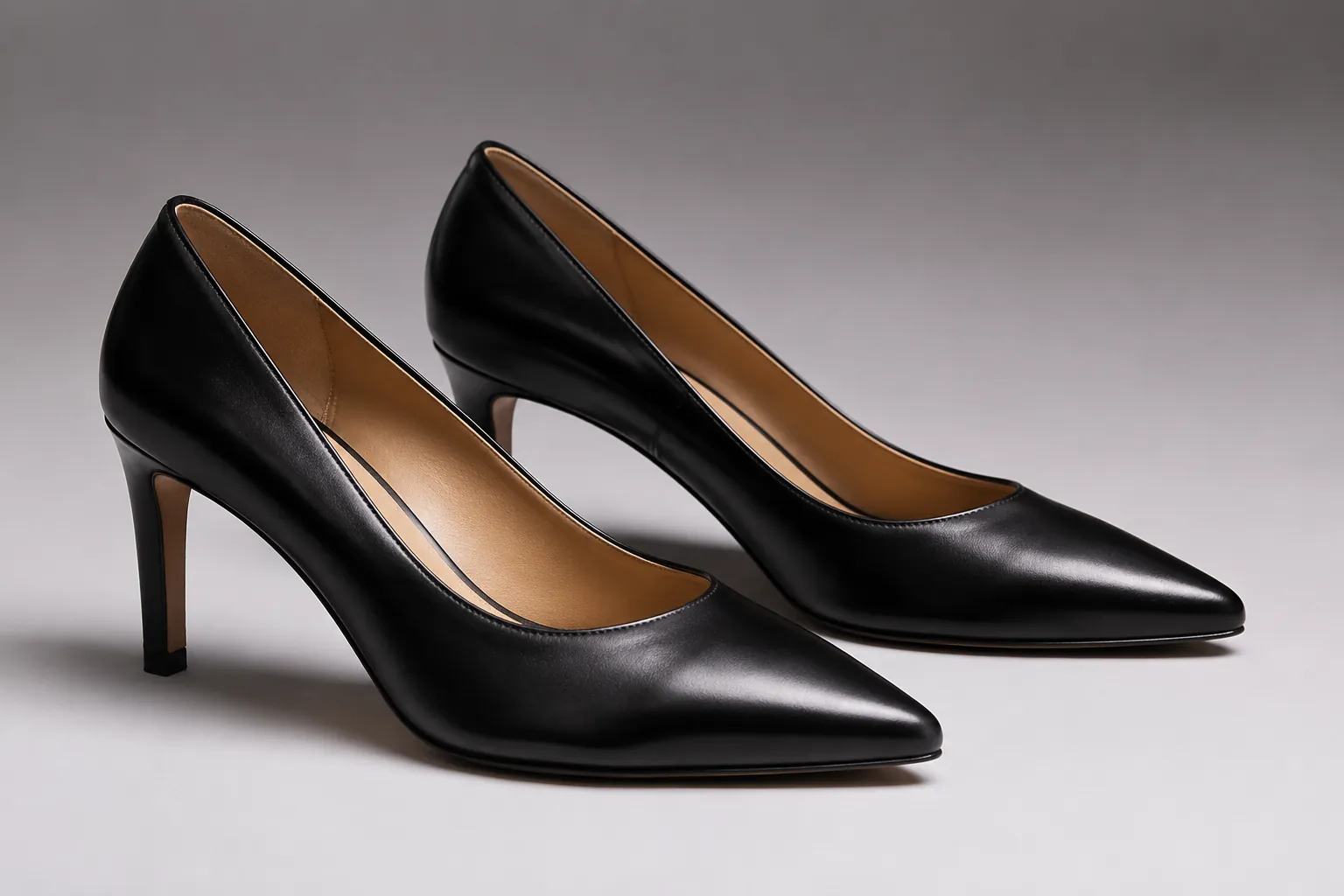 Black leather pump sample checked for heel balance and fit